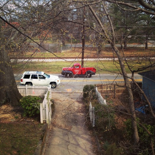 Sidewalk, sliver of grass, no curb and speeding traffic.