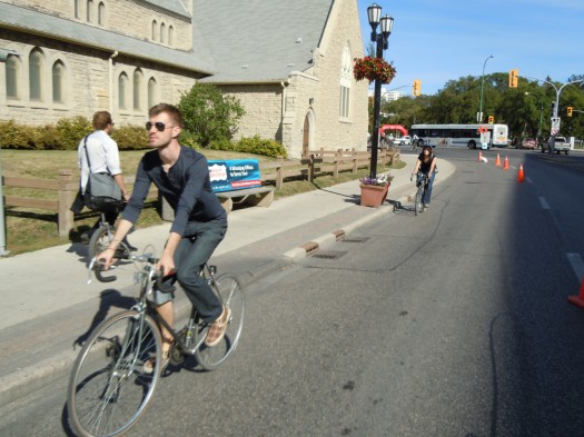 In streets and bike lanes, mixing safely with the traffic-calmed cars and frequent pedestrians.