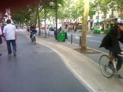 Paris has a similar cyclist network approach to Berlin, but without the wide rumblestrips to keep the cyclists in line! However, their bike-sharing is the most comprehensive on earth.