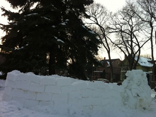 Kids version of an igloo in our front yard didn't quite get finished, but did provide a great fort for ongoing snowball fights.