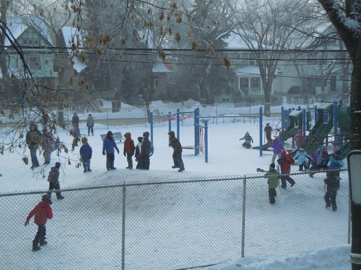 Students stay indoors for recess when the wind chill reaches -28 degrees Celsius. Otherwise, it's snowy fun, with winter gear policies enforced.