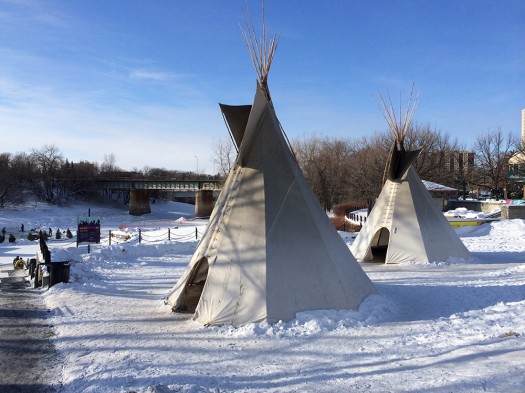 Tipis on the Assiboine River.