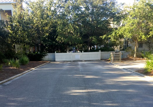 Watercolor, heading towards Odessa Street in Seaside. Note the second fence in front of the first fence, allowing just a sliver of space to get through.