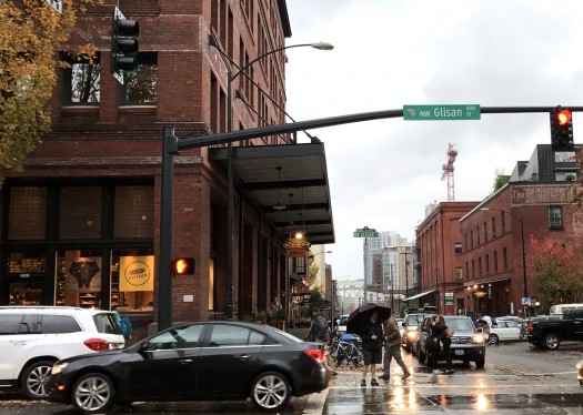 The Pearl District in Portland is an activated place, nurturing social, economic, and environmental health – where two friends are likely to share a rainy hug in the crosswalk.