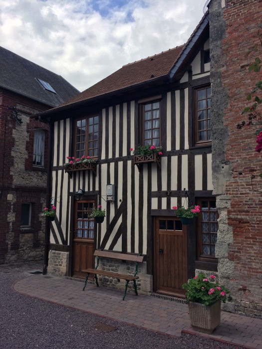 Details of the half-timbered architecture speak to the village being a center for craftsmen and trade in centuries past.