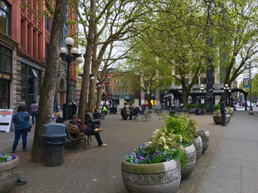 Triangular plazas make great community living rooms. Pioneer Park on 1st Ave.